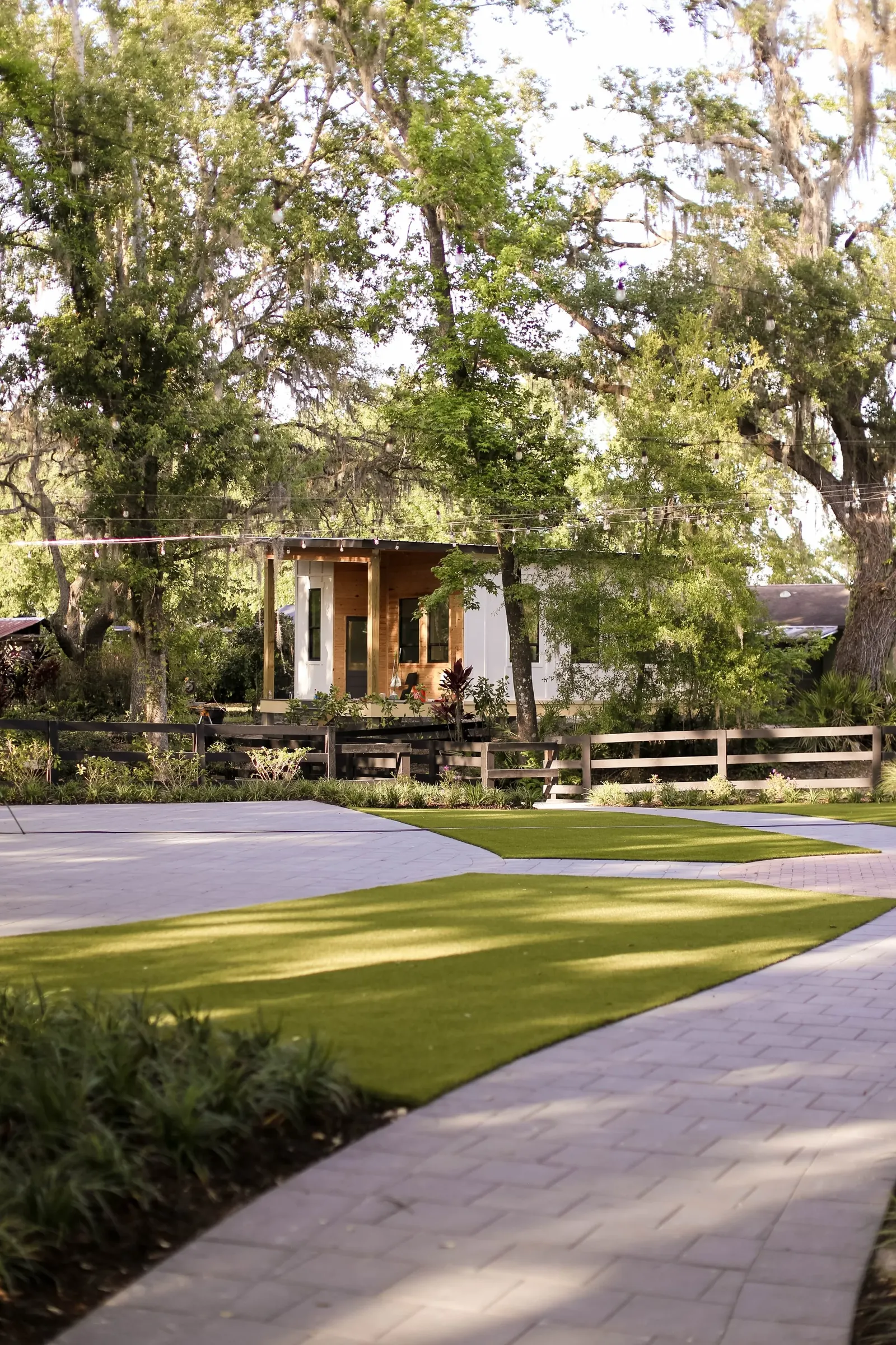 The shaded lawn and path leading to the ceremony courtyard